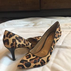 Pre- owned animal print pumps.